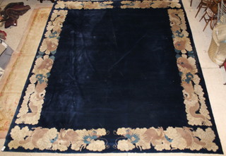 A good quality 1920's Chinese blue ground rug with dragon border 175" x 150" 