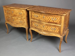 A handsome pair of 20th Century marquetry commodes of serpentine outline, the crossbanded tops inlaid geometric panels, fitted 2 short drawers, raised on cabriole supports 302h x 31"w x 19"d 