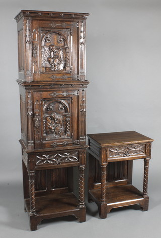 A pair of 17th Century style heavily carved oak double cabinets enclosed by panelled doors decorated scenes of a seated scholar with linen fold decoration to the sides, the bases fitted a drawer and raised on turned supports with undertier 50 1/2"h x 21 1/2"w x 16"d