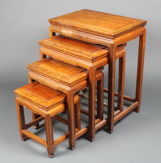 A nest of 4 Chinese hardwood interfitting coffee tables, largest 25"h x 20"w x 14"d, 21 1/2" x 17" x 12 1/2", 17" x 11 1/2" x 14" and smallest 13 1/2"h x 11"w x 10"d 