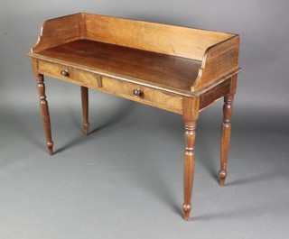 A Victorian mahogany wash stand with three-quarter gallery fitted 2 drawers, raised on turned supports 35"h x 47"w x 19"d 