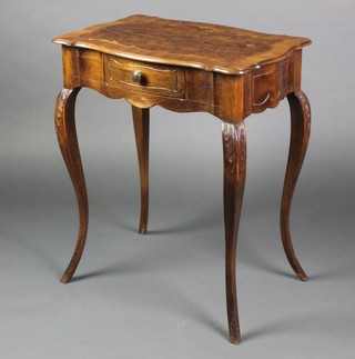 A 20th Century walnut and crossbanded occasional table of serpentine outline, fitted a drawer, raised on carved cabriole supports 27"h x 23"w x 14"d 
