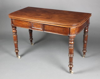 A Victorian mahogany D shaped concertina dining table, raised on turned supports with 1 extra leaf, 29"h x 40"w x 23" when closed by 61" when opened 