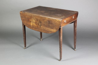 A 19th Century mahogany Pembroke table, fitted a frieze drawer and raised on square tapering supports, brass caps and casters 27"h x 32"w x 20" when closed x 40" when opened 