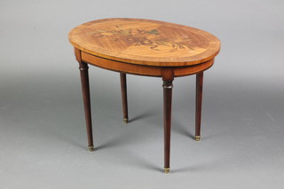 A 20th Century oval Kingwood quarter veneered occasional table, the top inlaid a floral spray and raised on turned supports 20"h x 26"w x 17 1/2"d 