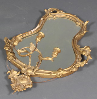 A 19th Century shaped plate mirror contained in a plaster frame, having 3 candle sconces to the base 36"h x 24"w (requires some attention) 