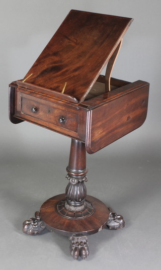 A William IV mahogany drop flap reading table with ratcheted top and drop flap to the side, the base fitted a drawer and raised on a turned column and circular base with scroll feet 30"h x 16" when closed x 31" when open x 18"d 