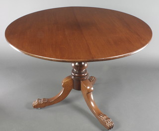 A Victorian mahogany circular snap top breakfast table raised on a turned column and tripod supports 30"h x 41 1/2" diam. 