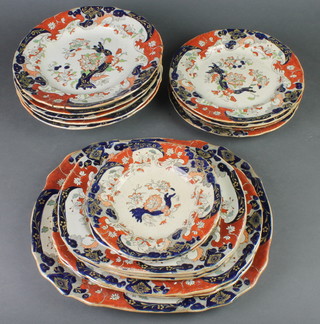 A Victorian ironstone part dinner service comprising 4 small dinner plates, 4 large dinner plates, a bowl, 2 side plates, 6 serving dishes and a tureen and cover 