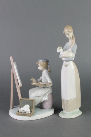 A Lladro figure of a seated girl artist 5063 8" and a ditto figure of a girl carrying a lamb 10" 