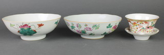 A Chinese tea bowl and saucer decorated with dragons, a pair of famille rose deep bowls