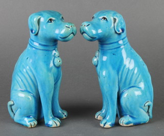 A pair of Chinese turquoise glazed seated dogs 7"
