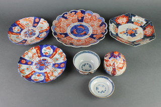 An Imari scallop shaped dish decorated with flowers and birds 10", 3 other dishes, 2 bowls and a saucer and a lid 