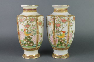  A pair of late Satsuma hexagonal vases decorated with panels of flowers and birds 11" 