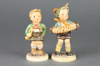 2 Hummel figures of boys, 1 holding a bugle, the other a concertina 3" 