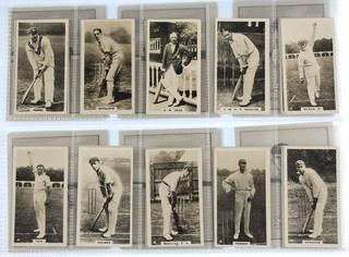 Cigarette cards, W D & H O Wills, Overseas British Cricketers 1926, a set of 25 together with R & J Hills of London, Caricatures  of Famous Cricketers 1926 a set of 50 