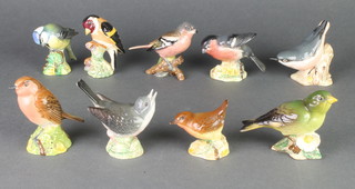 A collection of 9 Beswick bird figures 3" 
