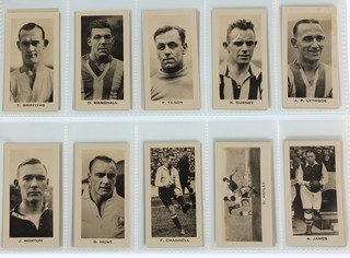 Cigarette cards,  John Sinclair Ltd, English and Scottish Football Stars 1935, a set of 50 together with W D & H O Wills, Association Footballers 1935, frameline backs, a set of 50