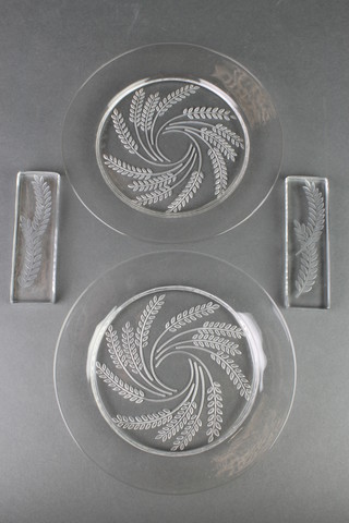 A pair of Lalique Hortense wheat pattern dishes 6 1/2" together with a pair of knife rests 4", etched lower case R Lalique