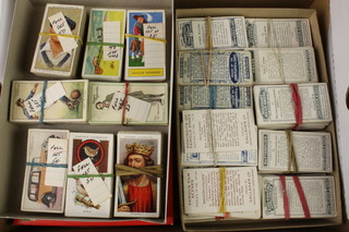 A quantity of various cigarette cards