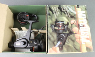 A Mitchell 5540 RD fishing reel, boxed and unused
