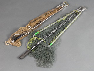 A Hardy metal framed salmon landing net together with a smaller trout net 