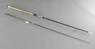 An early Grayes of Aldwick (Hardy's) 8' carbon fibre spinning fishing rod 