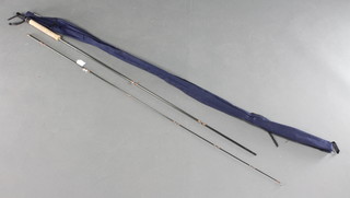 A Norway built carbon fibre fly rod complete with sleeves 