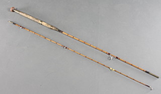 An 8' split cane spinning fishing rod