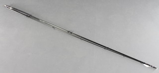 A Normark Silver Medal 10' 6-89 carbon fibre fishing rod 