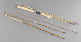 A vintage Scottish boat fishing rod together with a split cane fishing rod