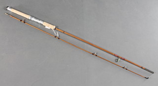 Sharpes of Aberdeen, a Scotty split cane 7'6" twin section fishing rod 