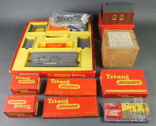 A Triang OO R161 operating Hopper car set, ditto R.76 engine shed, a Triang R70 level crossing, an R79 Inclined Piers, an R42 speed control unit, etc, all boxed 