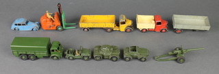 A Dinky Supertoy 10 ton Army truck, a field gun, 3 military vehicles, a Dinky forklift truck and other vehicles
