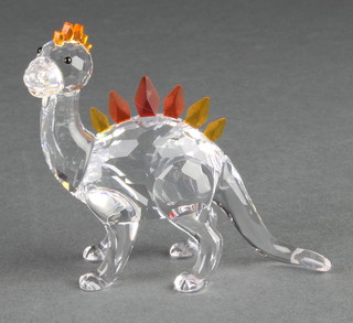 A Swarovski figure of a dinosaur with coloured detail 2 3/4", boxed 