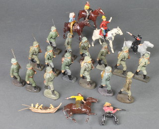 A collection of various plastic figures of soldiers 