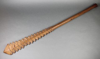A 19th century"Samoan" club/paddle  impressed T H Coker twice to the blade and once to the  base 