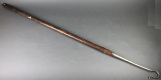 A 19th Century polished steel and elm crook