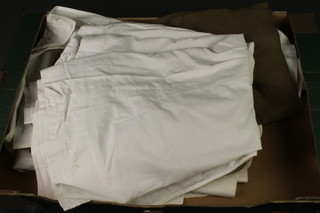 A nurses apron by Garrould and 3 other nurses white aprons and a collection of collars