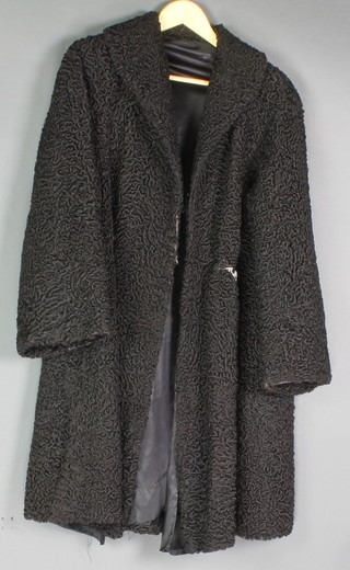 A lady's black Persian lamb full length jacket 
