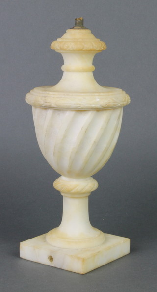 A turned alabaster table lamp base raised on a square base 10" 