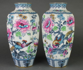 A pair of Losol Ware octagonal vases decorated with Ho Ho among flowers 12" 