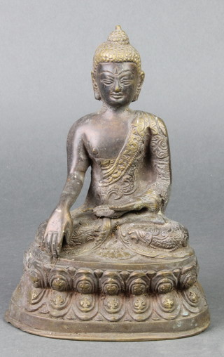 A Chinese bronze figure of a seated Buddha 8" 