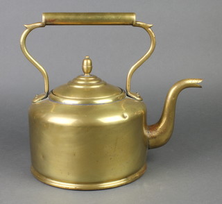 A circular brass kettle with acorn finial 9" 
