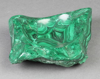 An ashtray formed from a section of malachite 7" x  5" 