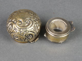 A Victorian repousse silver toilet bottle lid
