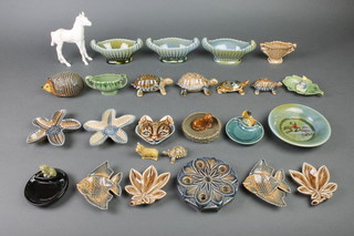 A collection of Wade ashtrays, tortoises etc 