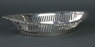 An Edwardian silver elliptical dish with shell borders and pierced floral decoration, Birmingham 1902, 332 grams, 13 1/2"  