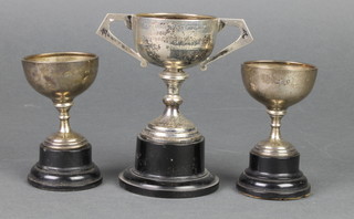2 silver trophy cups with ebonised socles, 92 grams