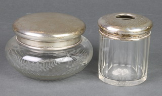 A silver mounted hair tidy and a ditto toilet jar
